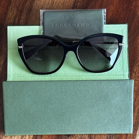 Longchamp LO627S 001 Black Gold Cat Eye Sunglasses 57-16-140 Gradient Lens
